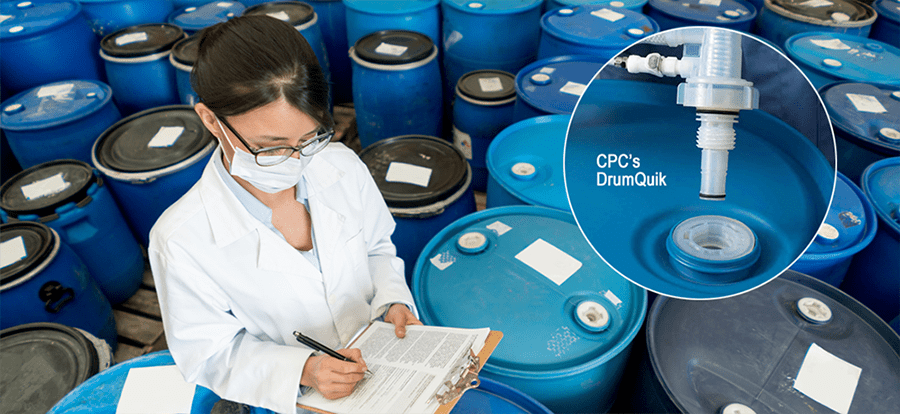 Woman surrounding by drum containers featuring CPC's DrumQuik product line